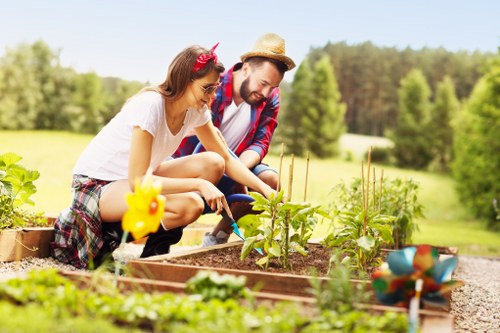 Gardener assessing site safety before starting work